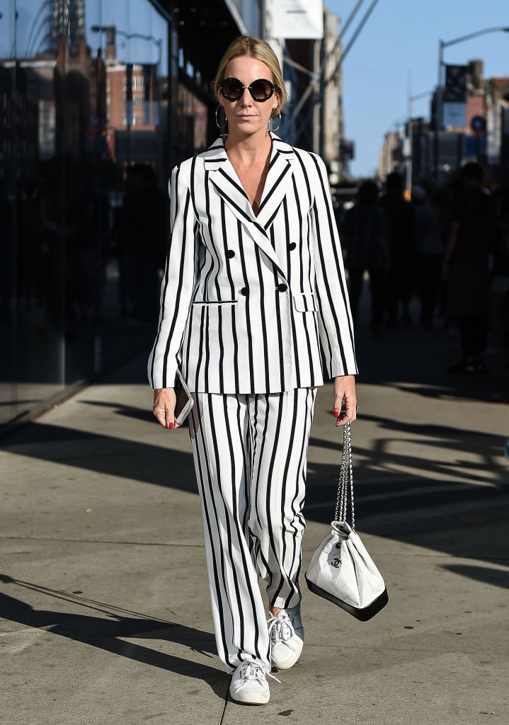 Ženska in striped pantsuit